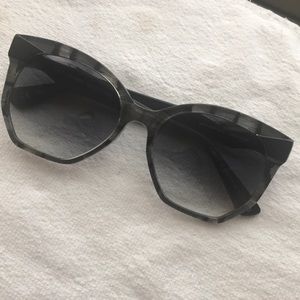 Authentic Ete Lunettes handmade sunglasses.